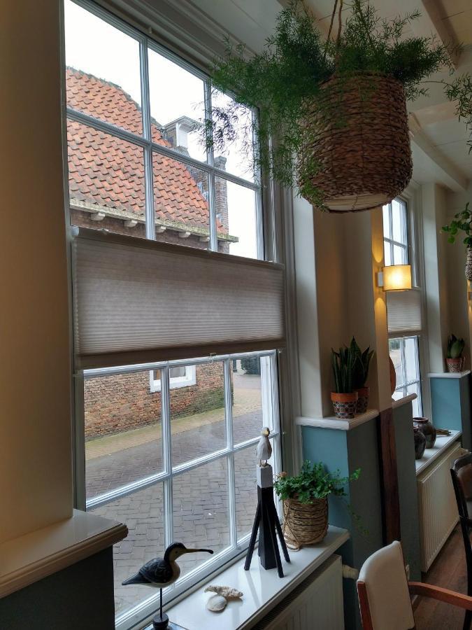 Bed & Brasserie Het Kosthuys Синт Маартенсдайк Екстериор снимка