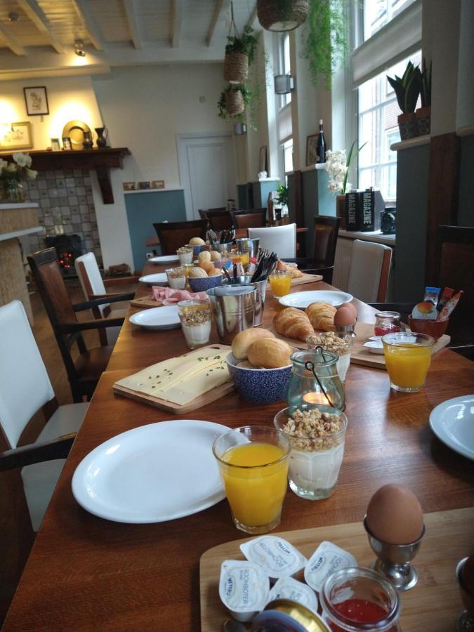 Bed & Brasserie Het Kosthuys Синт Маартенсдайк Екстериор снимка